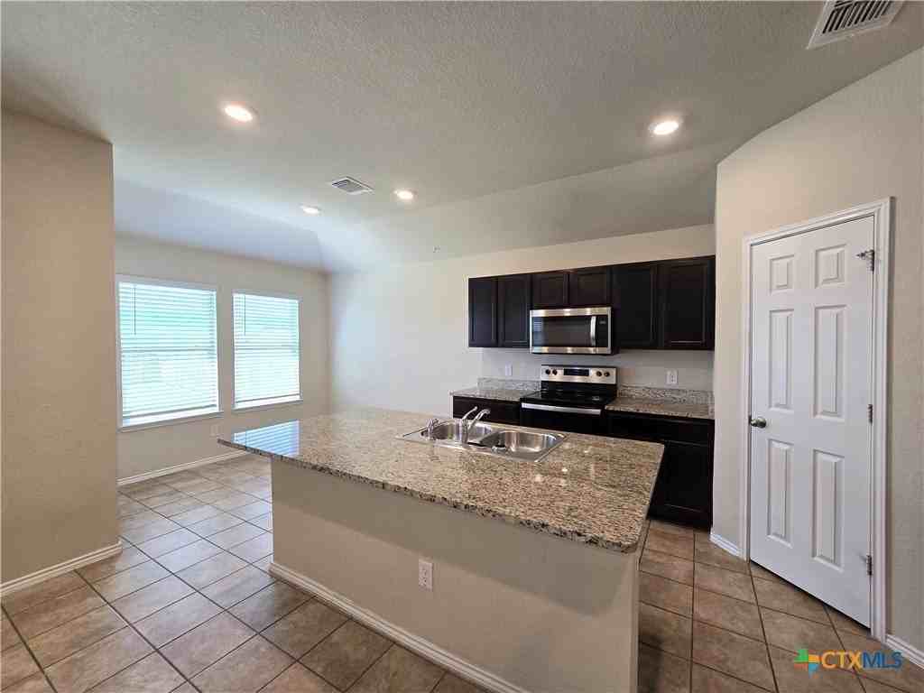 6114 Sally Ride Ln - Photo 5 of 23