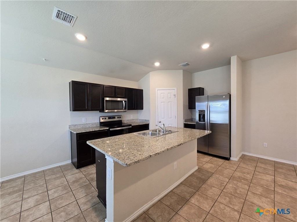 6114 Sally Ride Ln - Photo 6 of 23