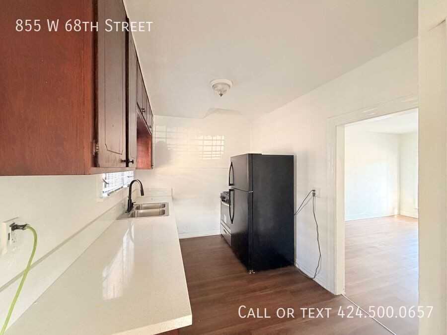 855 W 68th St - Photo 3 of 11