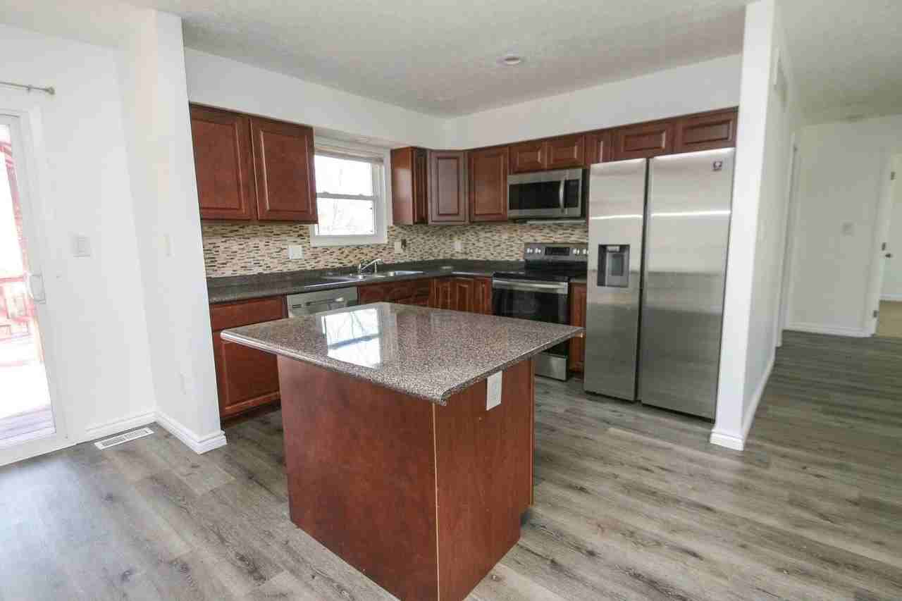 1080 Arapaho Ave - Photo 3 of 36