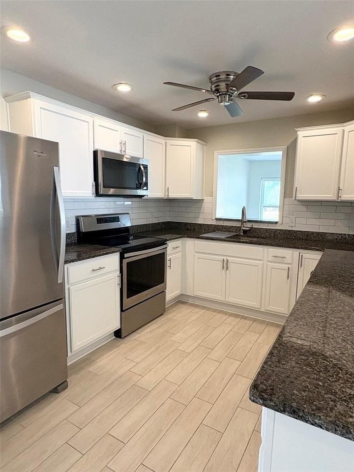736 86th Ave N - Photo 5 of 30