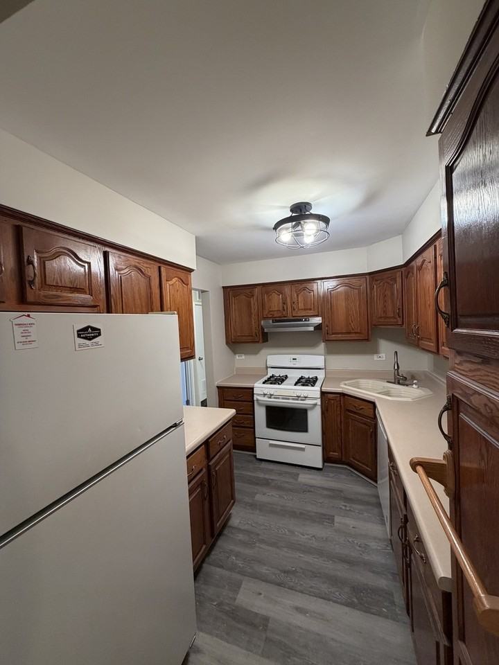 7333 Grand Ave ##102 - Photo 5 of 11