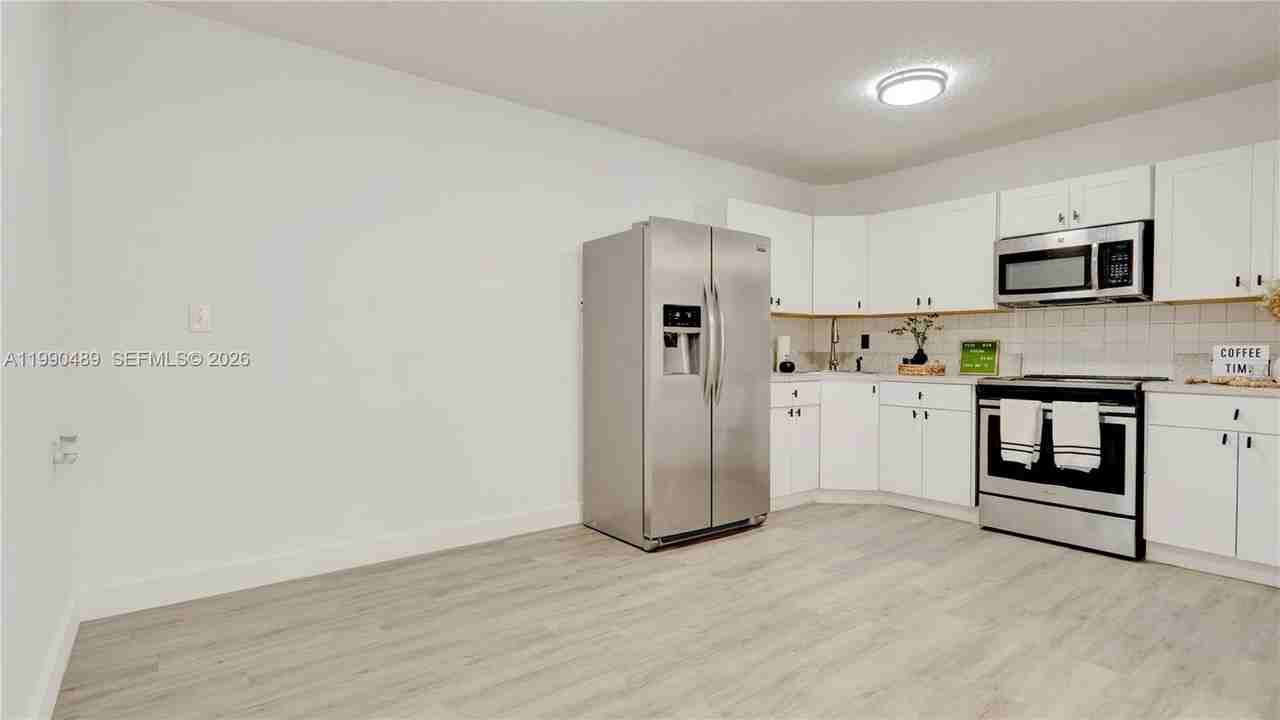 1036 Nw 75th St #MAIN - Photo 7 of 12