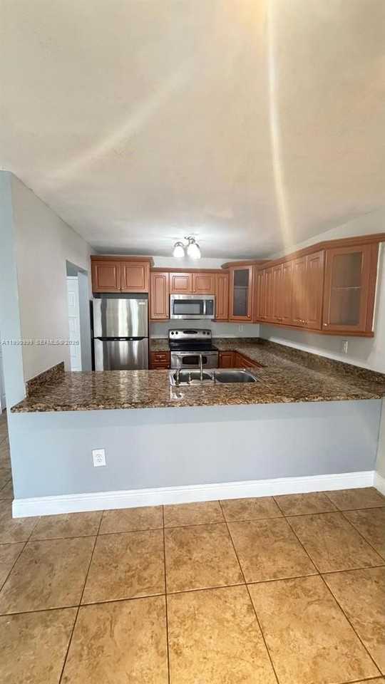 6980 Nw 186th St #3-126 - Photo 3 of 12