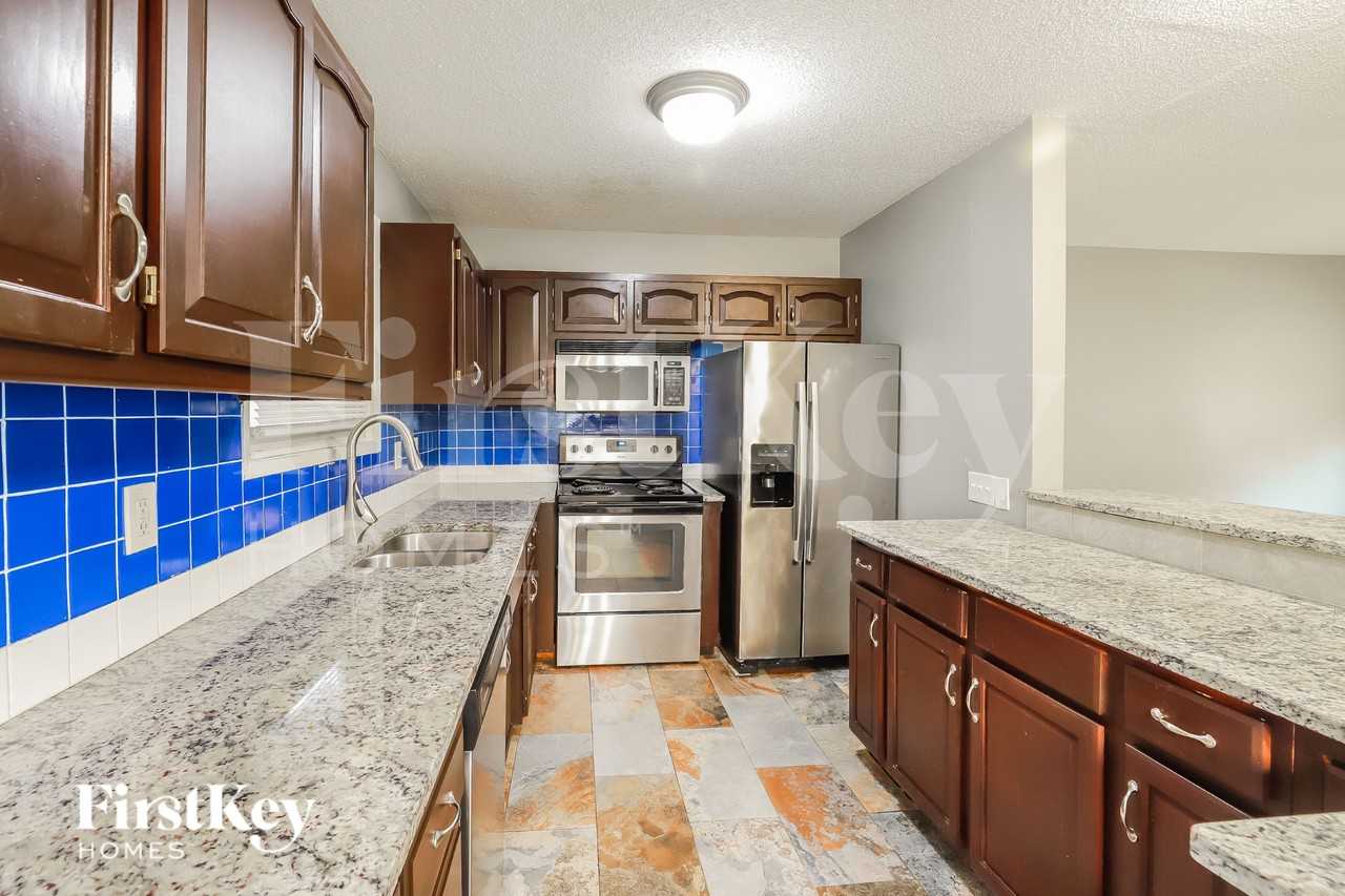 5013 Nw Woody Creek Ln - Photo 6 of 16