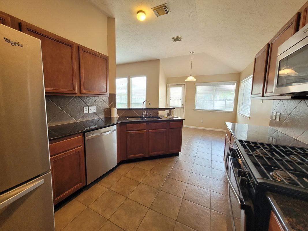 11826 Fortune Park Dr - Photo 3 of 3