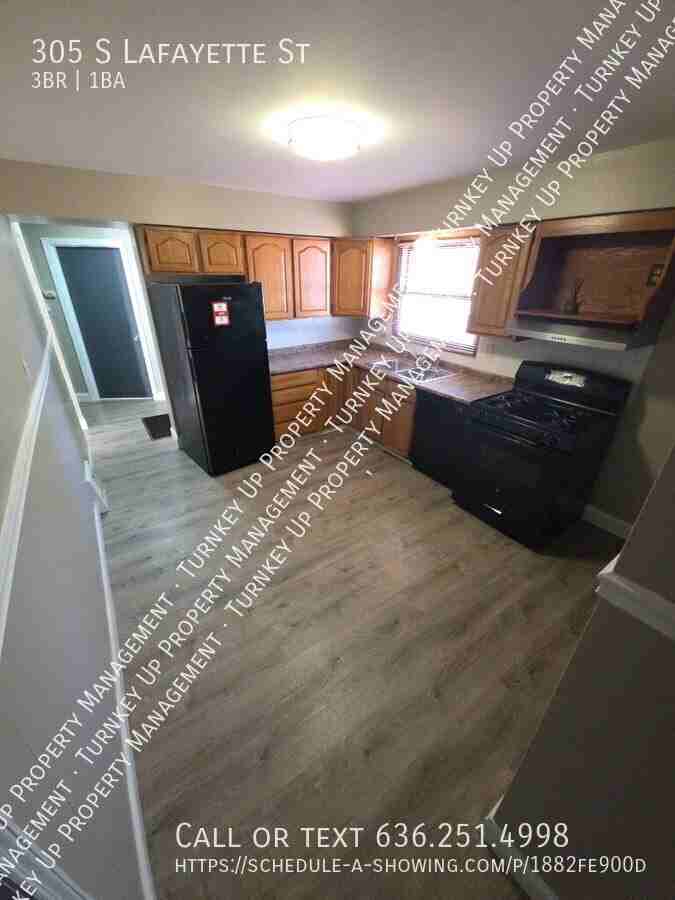 305 S Lafayette St - Photo 3 of 11