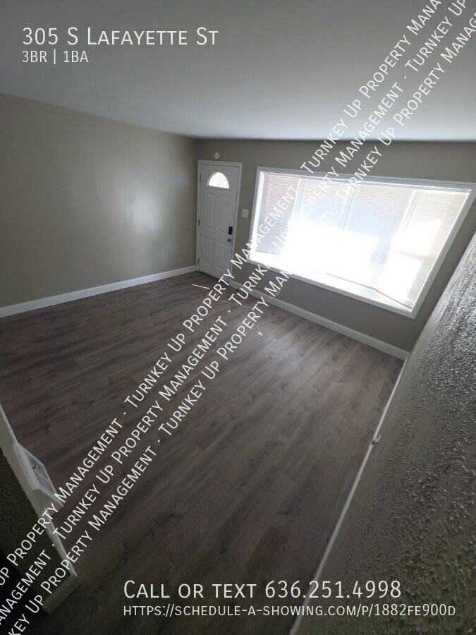 305 S Lafayette St - Photo 4 of 11