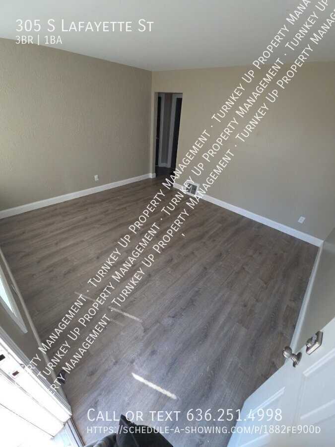 305 S Lafayette St - Photo 5 of 11