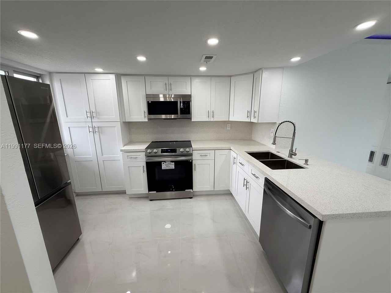 9915 W Okeechobee Rd #2-201 - Photo 2 of 11