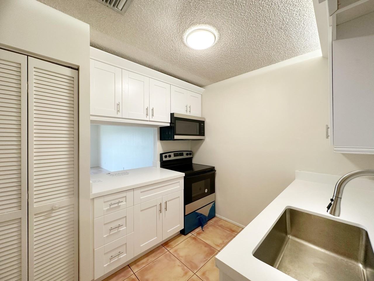 11453 Nw 39th Ct Apt 309-2 - Photo 3 of 35