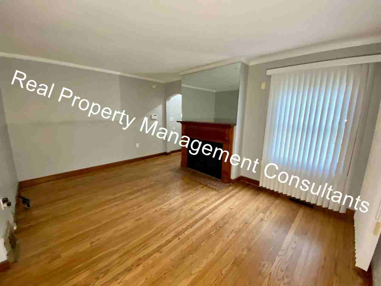 1716 E 77th Ter - Photo 4 of 20