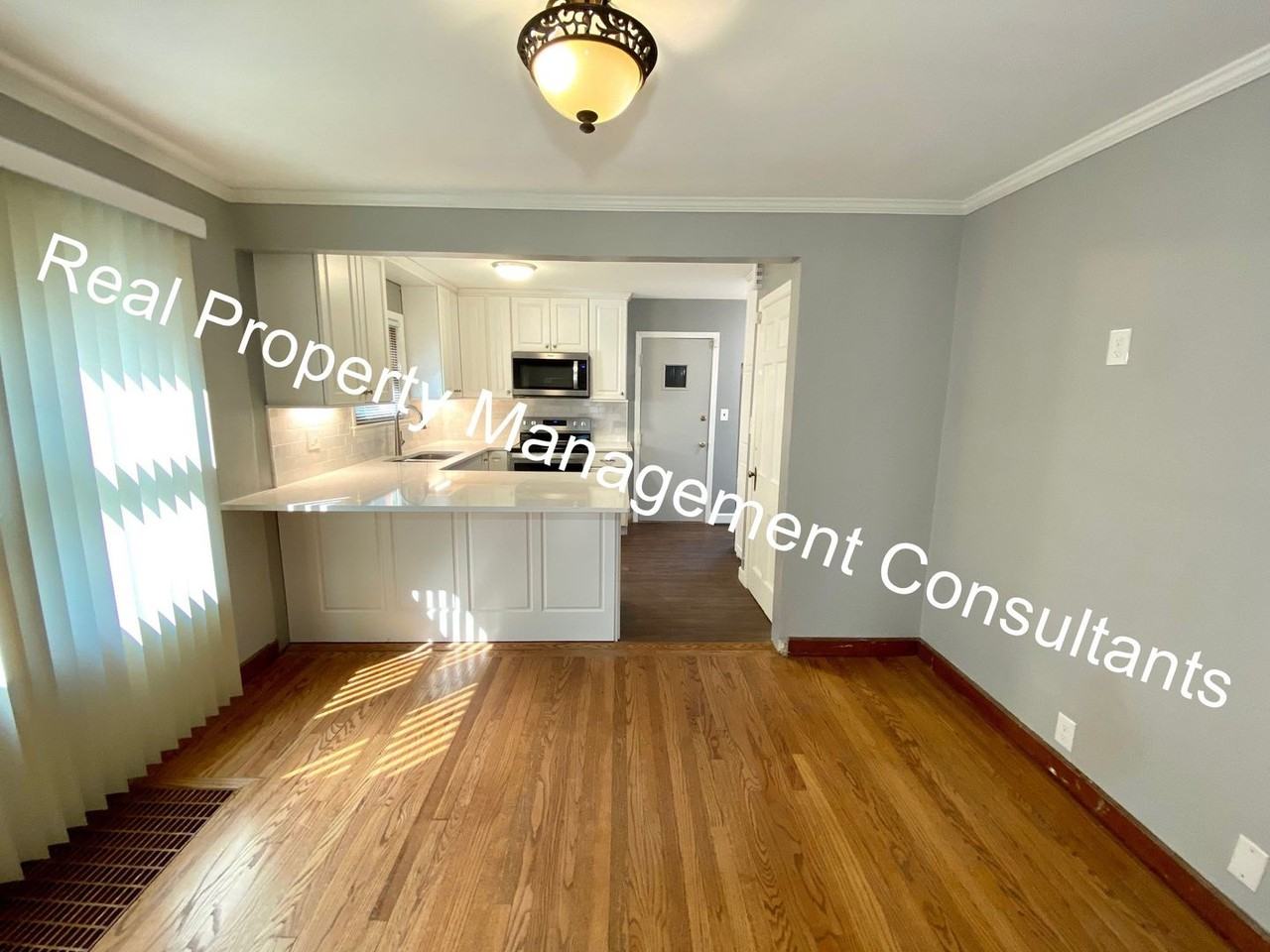 1716 E 77th Ter - Photo 5 of 20