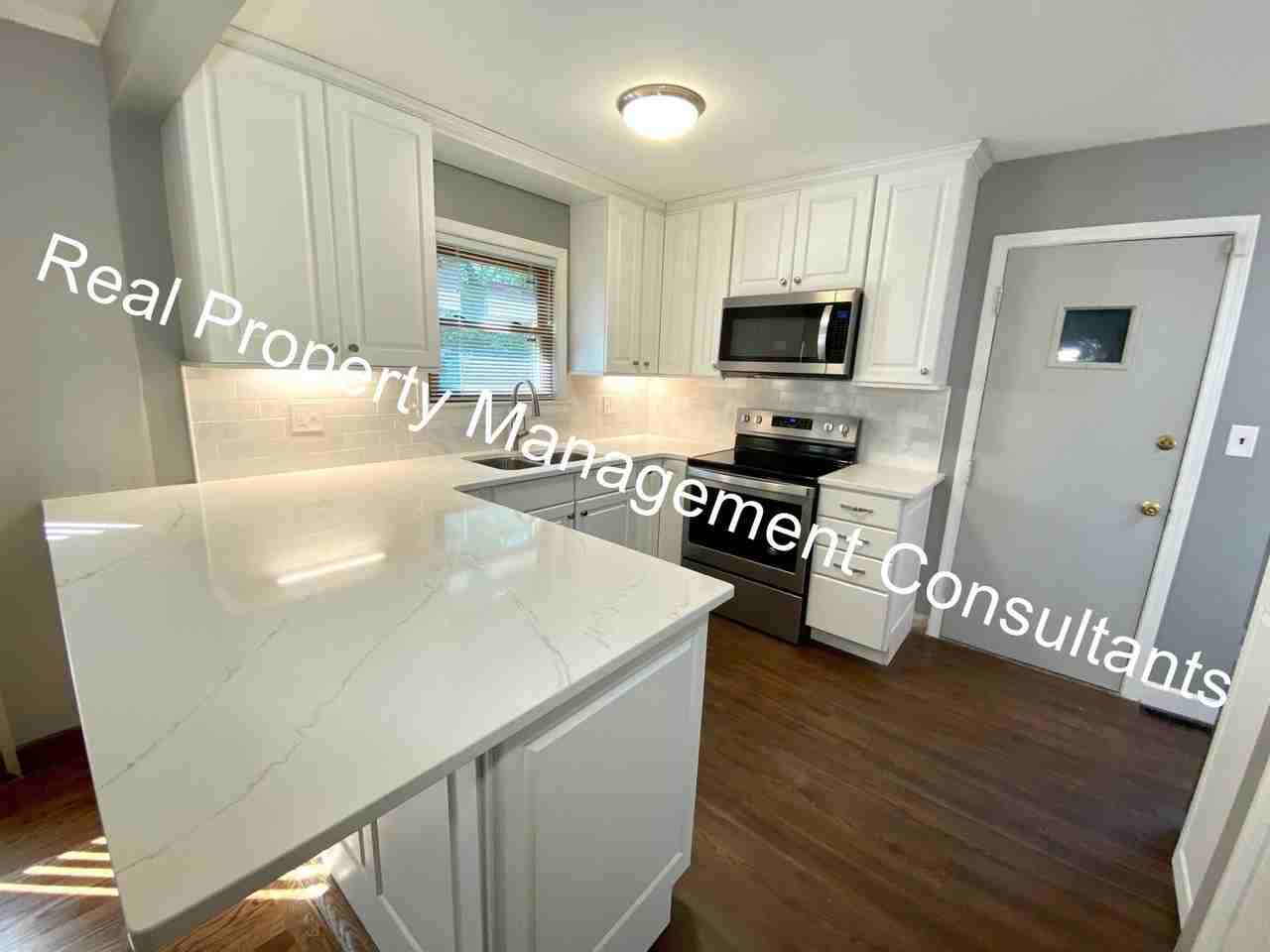 1716 E 77th Ter - Photo 6 of 20