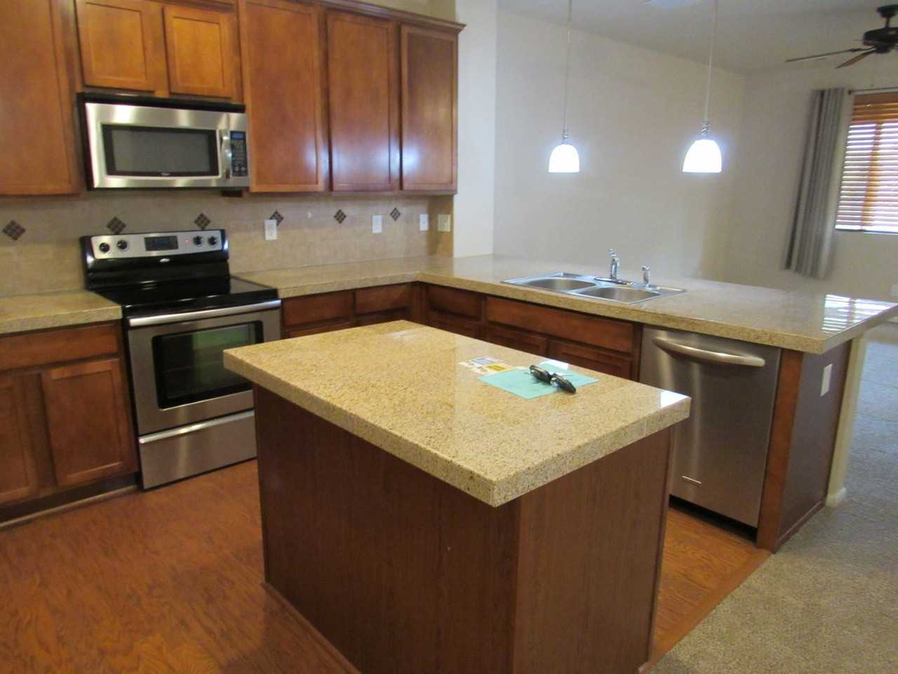 15442 W 66th Ave #F - Photo 3 of 21