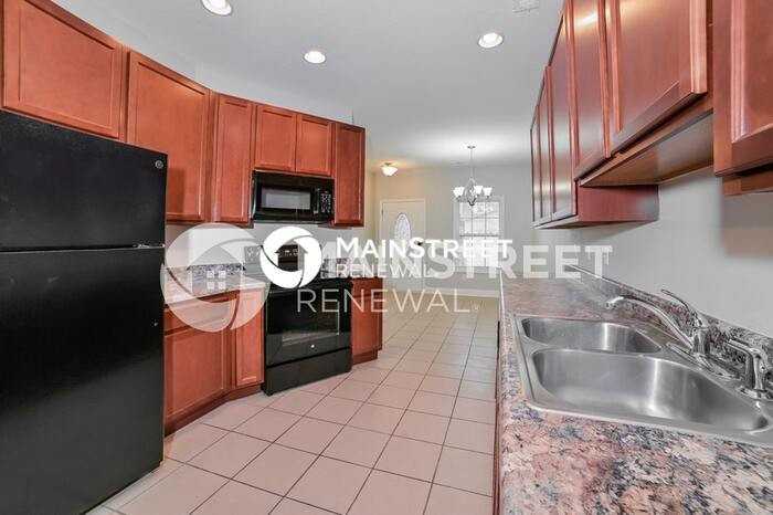 7012 Edon Hall Way - Photo 6 of 17