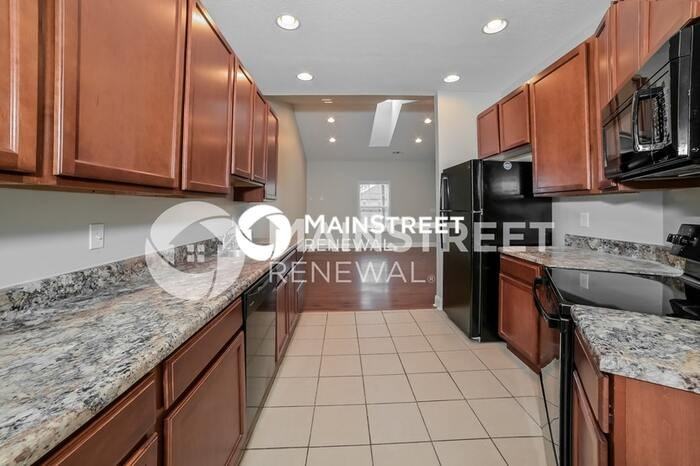 7012 Edon Hall Way - Photo 7 of 17