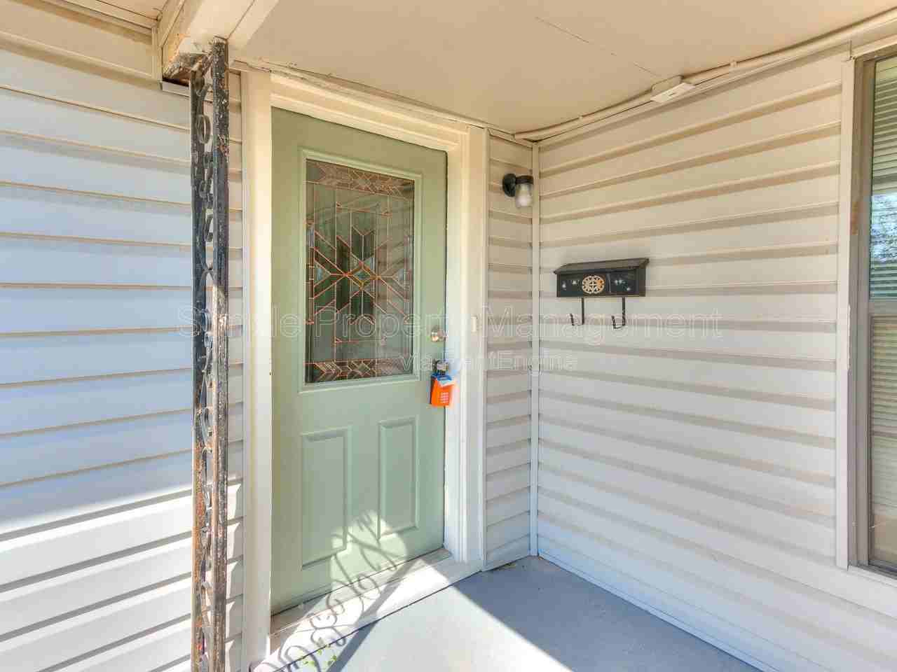 9706 N Garnett St - Photo 2 of 29