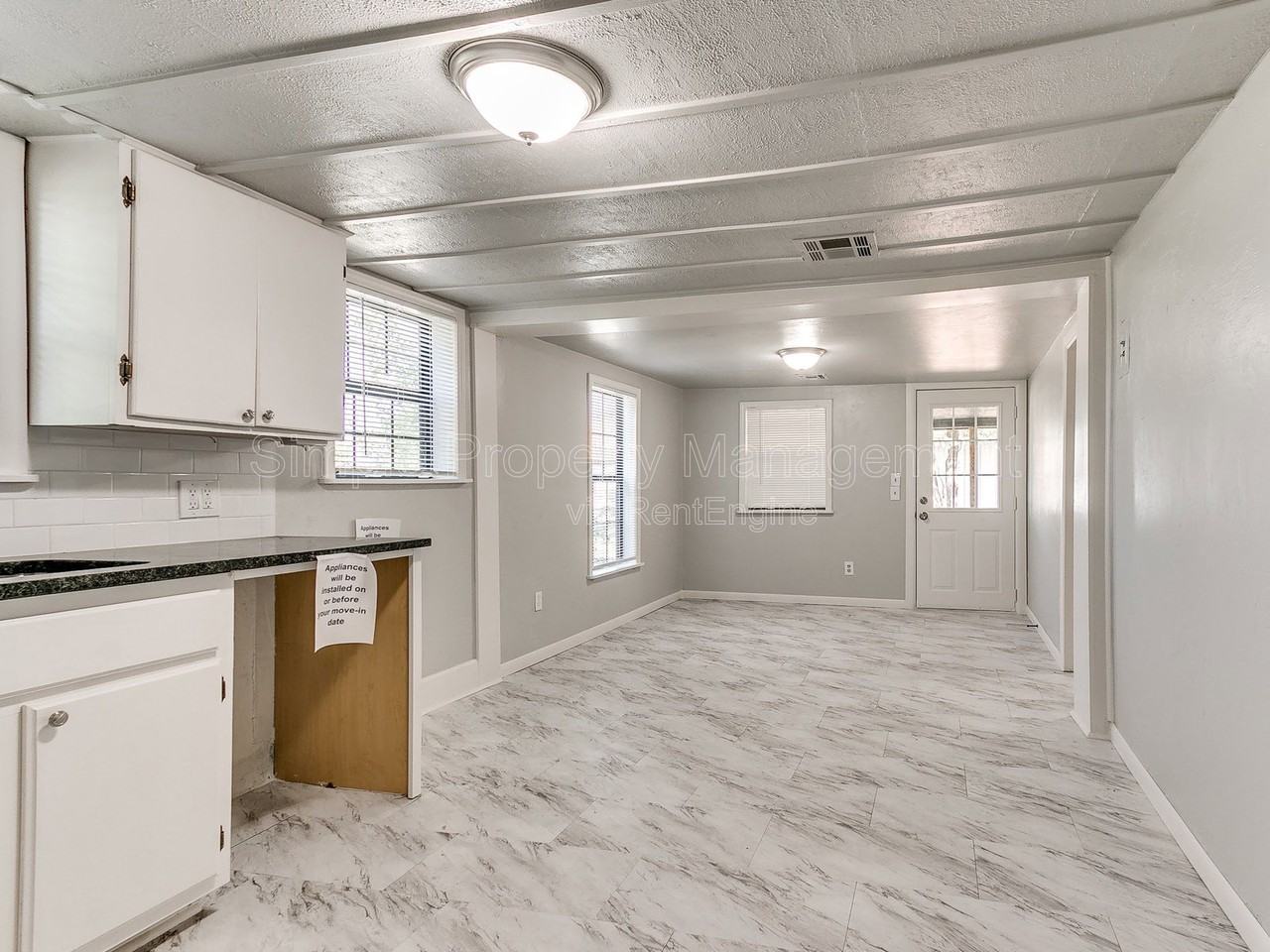 9706 N Garnett St - Photo 6 of 29