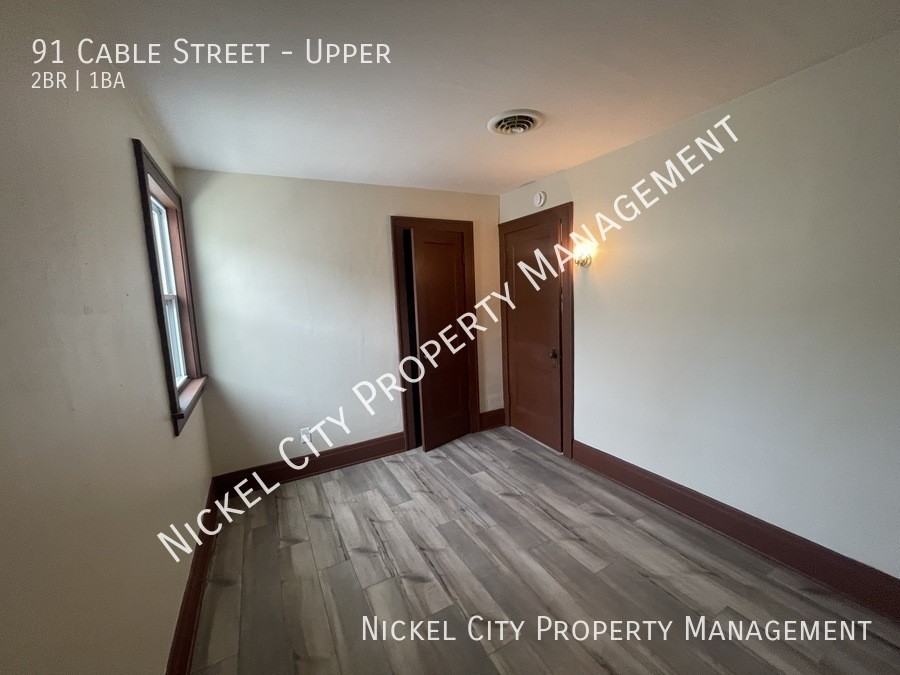 91 Cable St - Photo 2 of 8