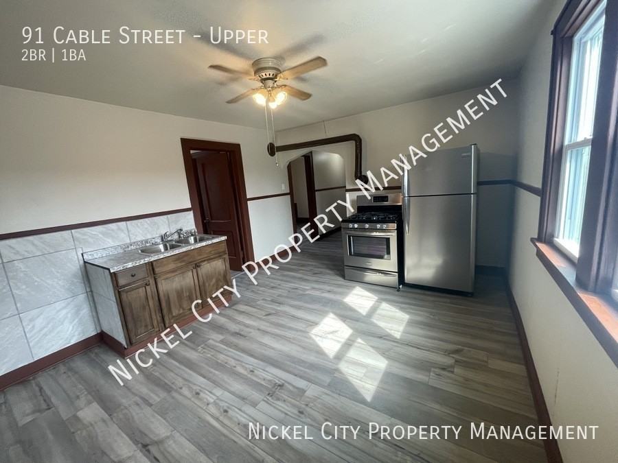 91 Cable St - Photo 6 of 8