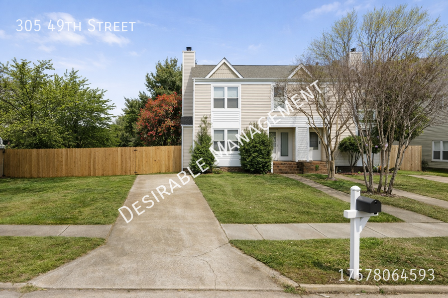 305 49th St - Photo 3 of 5