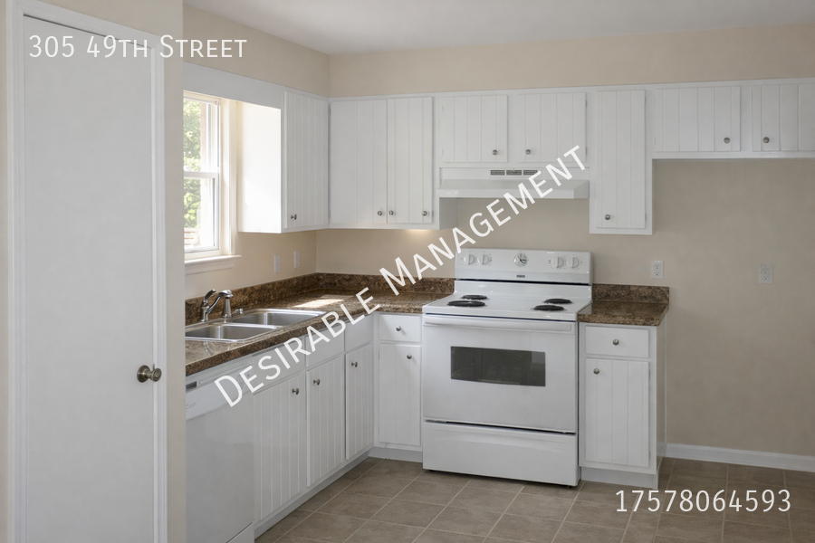 305 49th St - Photo 5 of 5