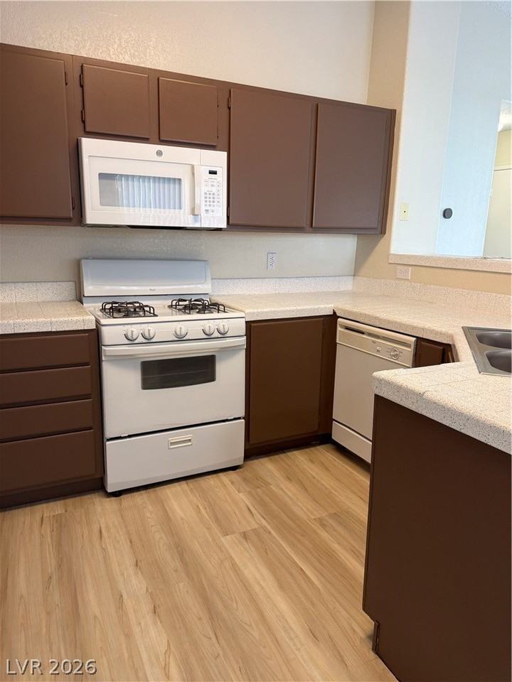 701 Wheat Ridge Ln #202 - Photo 2 of 12