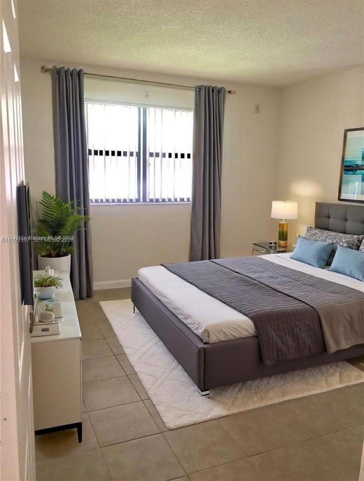 7130 Nw 179th St #207 - Photo 3 of 14