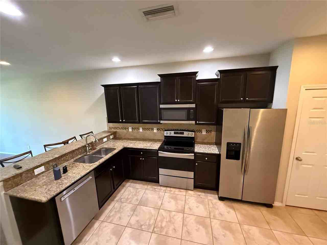 8827 Turnstone Haven Pl - Photo 3 of 15