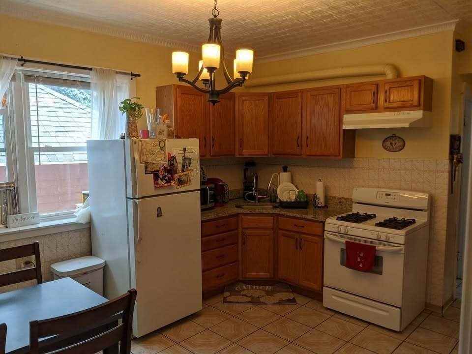 2131 N Lorel Ave Apt 1 - Photo 7 of 8