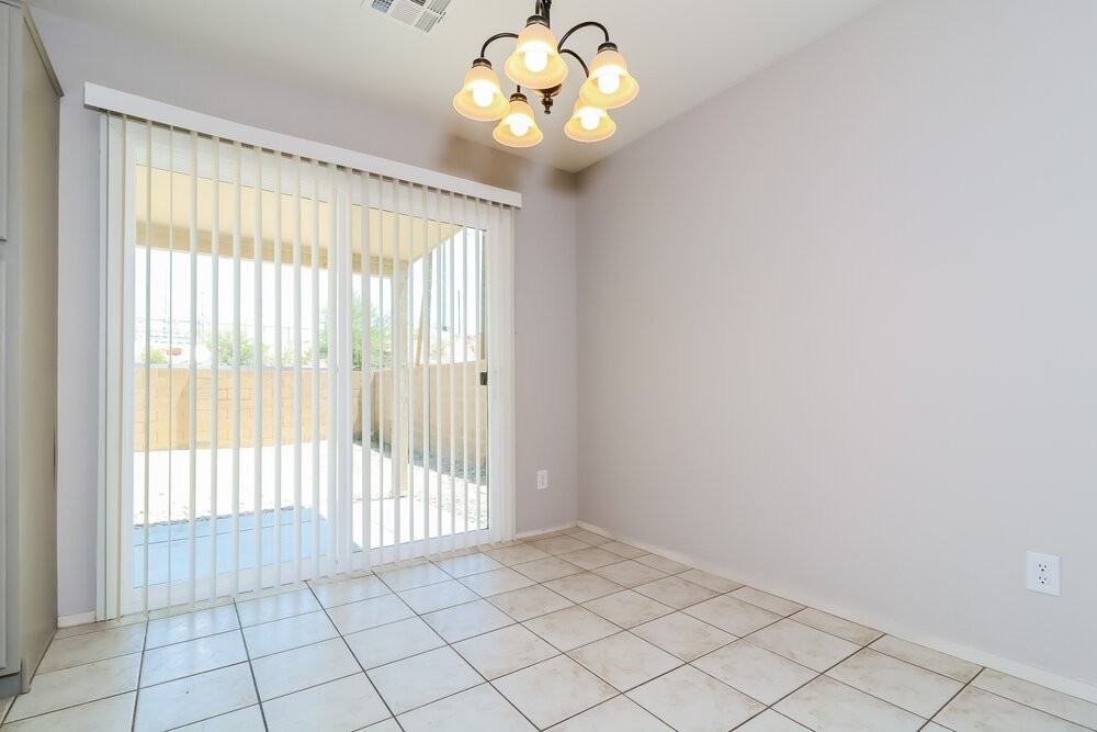 10043 N 115th Dr - Photo 7 of 16