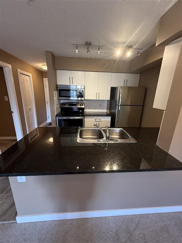 316 Mcconachie Dr Nw - Photo 2 of 16