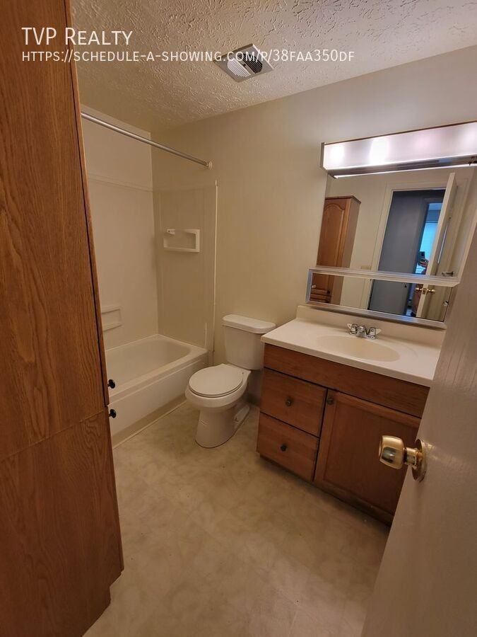 1454 W River Rd N Apt S - Photo 5 of 5