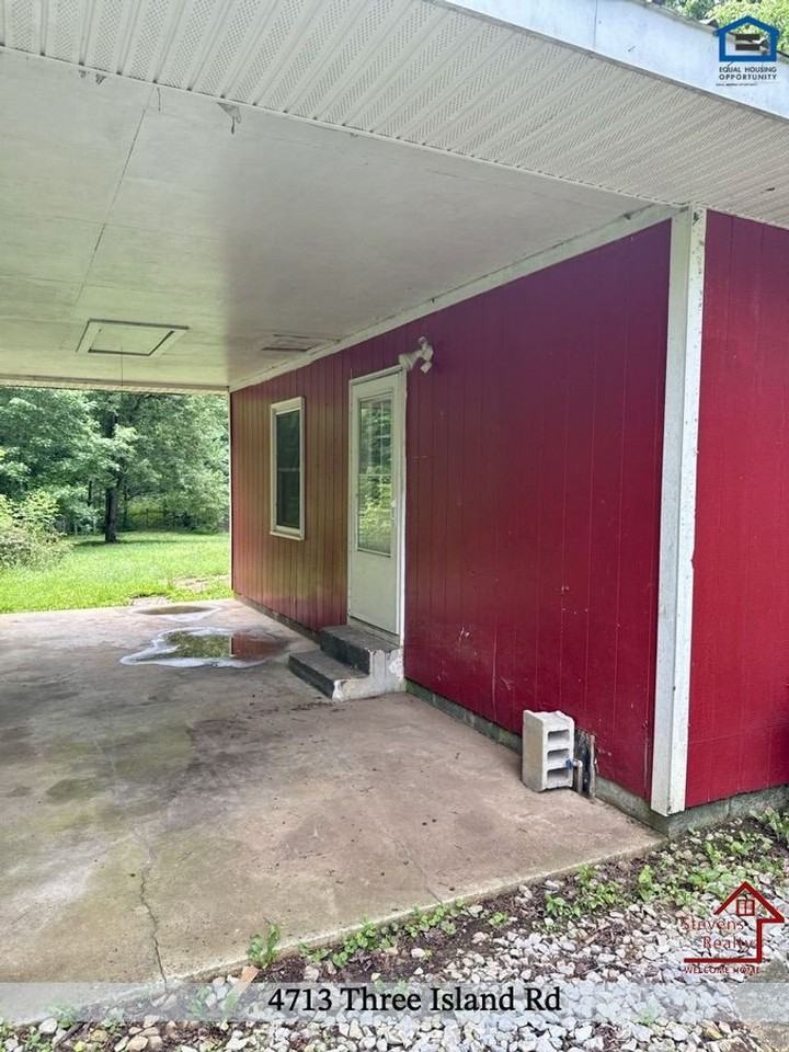 4713 Three Island Rd - Photo 5 of 31