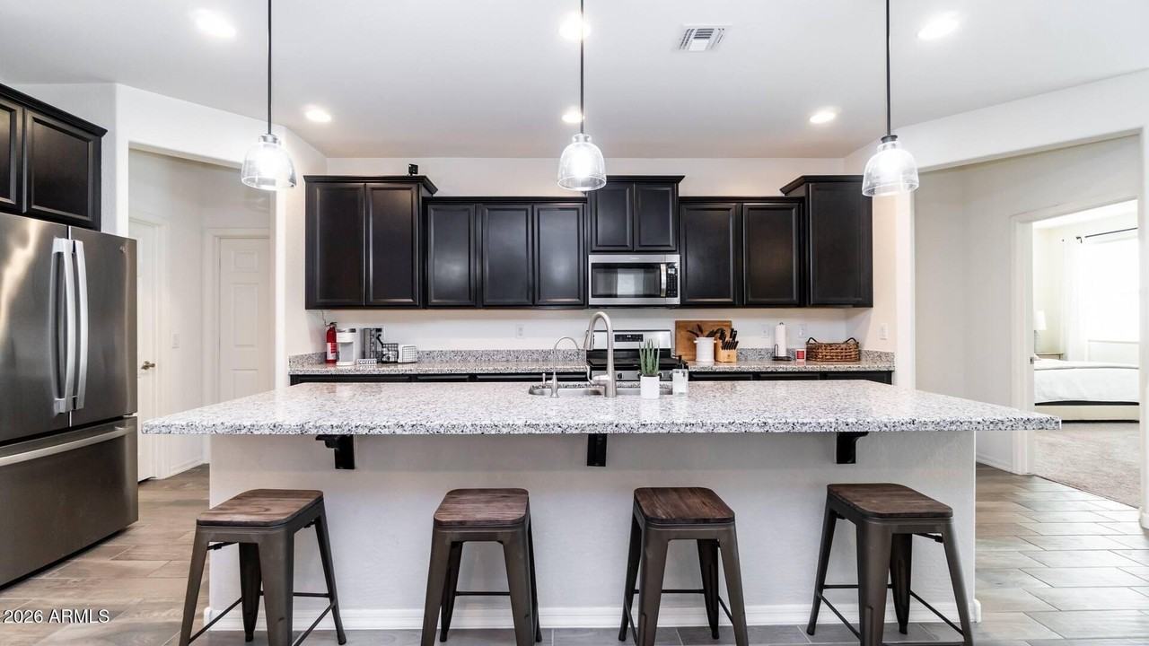 10793 S 174th Ave - Photo 7 of 20