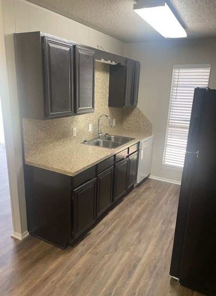 Wall Street Apartments - Photo 2 of 4