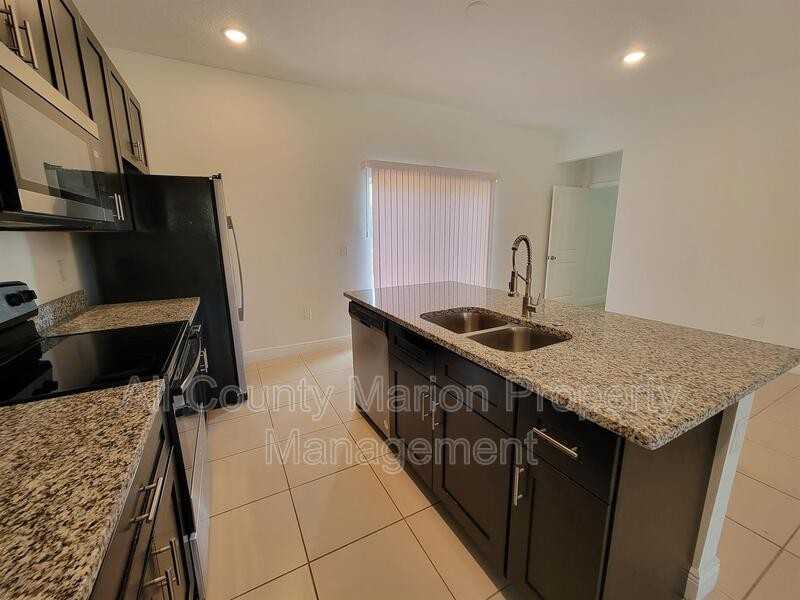 405 Marion Oaks Ln - Photo 5 of 14