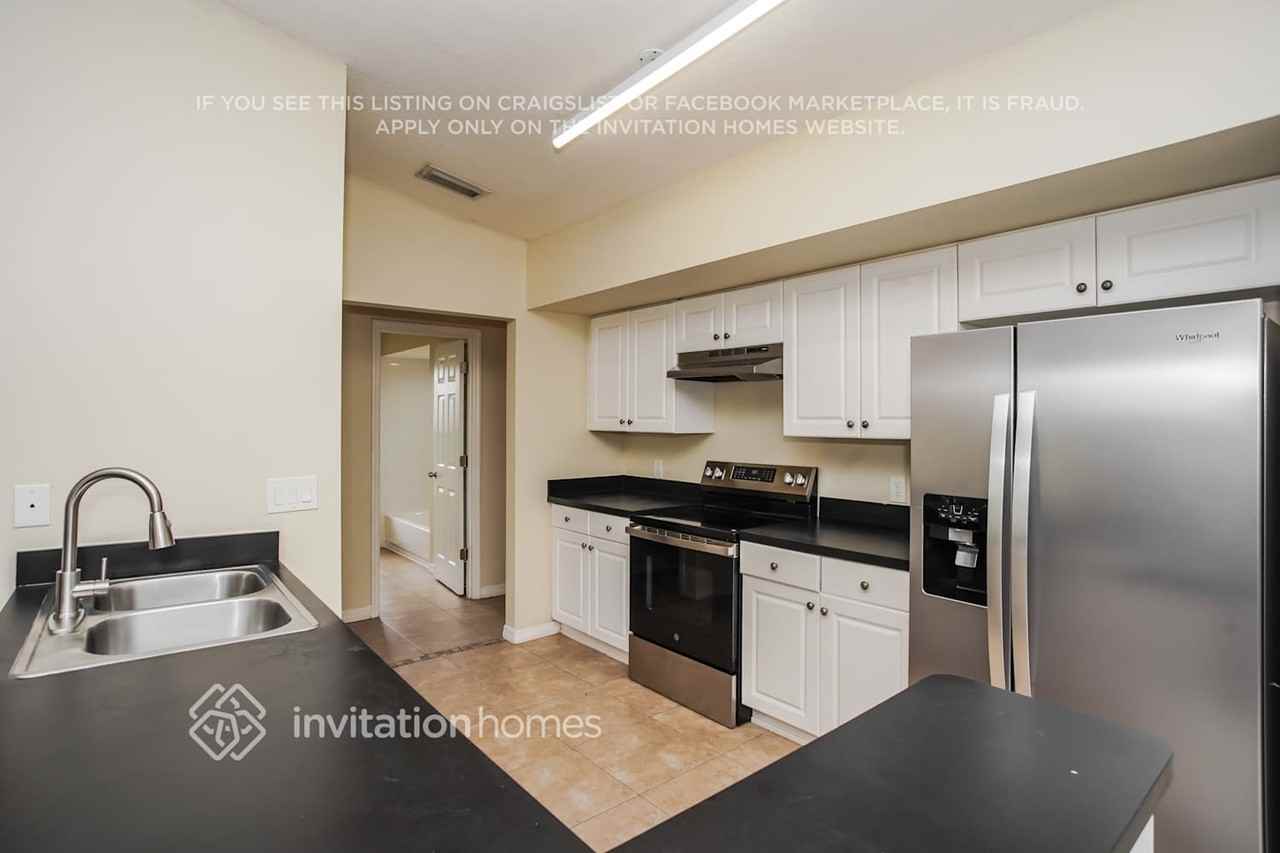 8907 68th Ave E - Photo 5 of 17