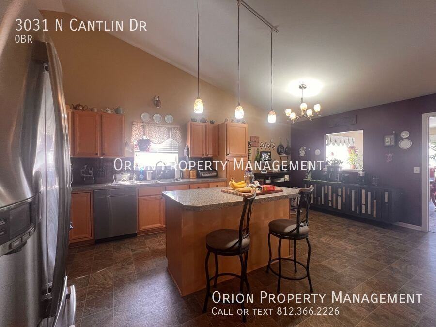 3031 N Cantlin Dr - Photo 5 of 13