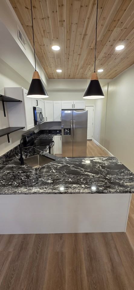 1415 E Lanvale St - Photo 2 of 16