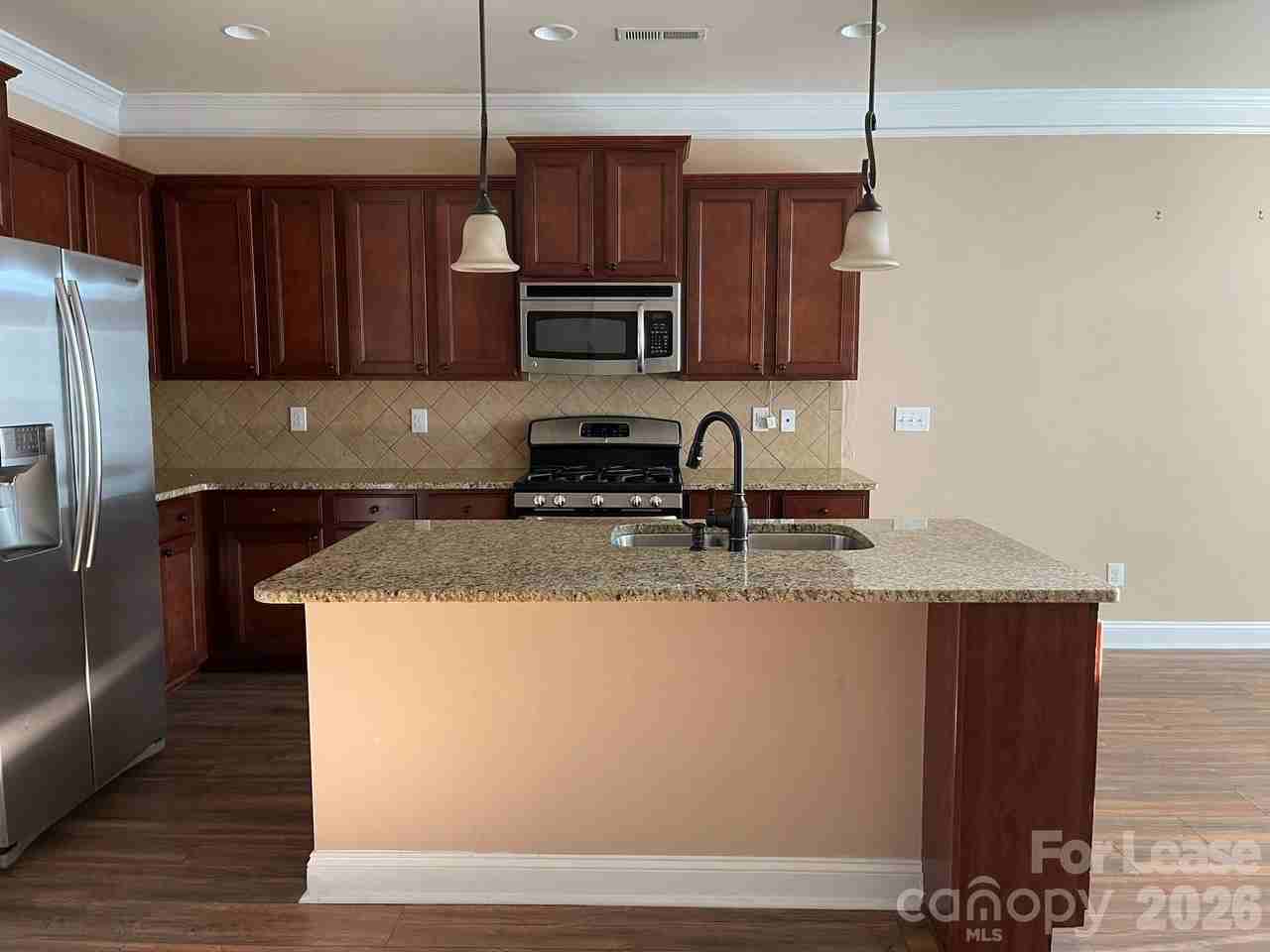 9596 Audley End Ct Nw - Photo 2 of 16