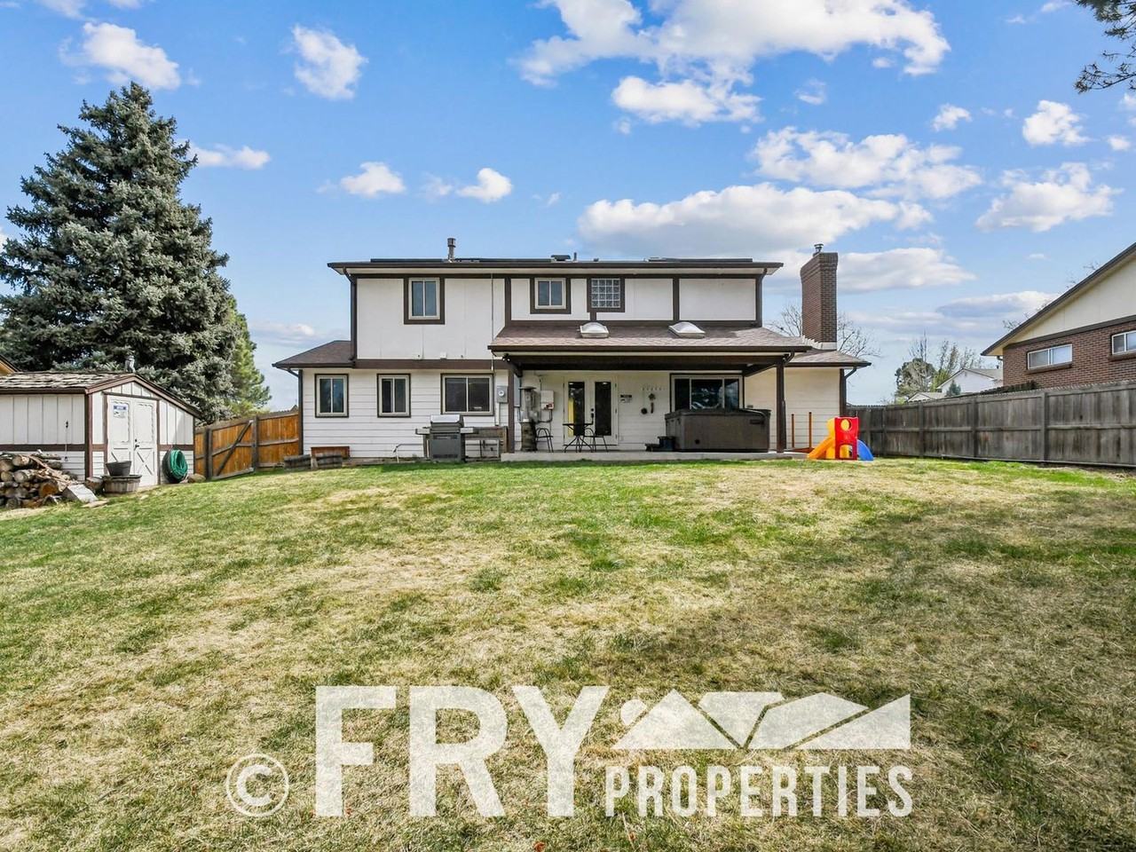 4467 S Zenobia St - Photo 4 of 30