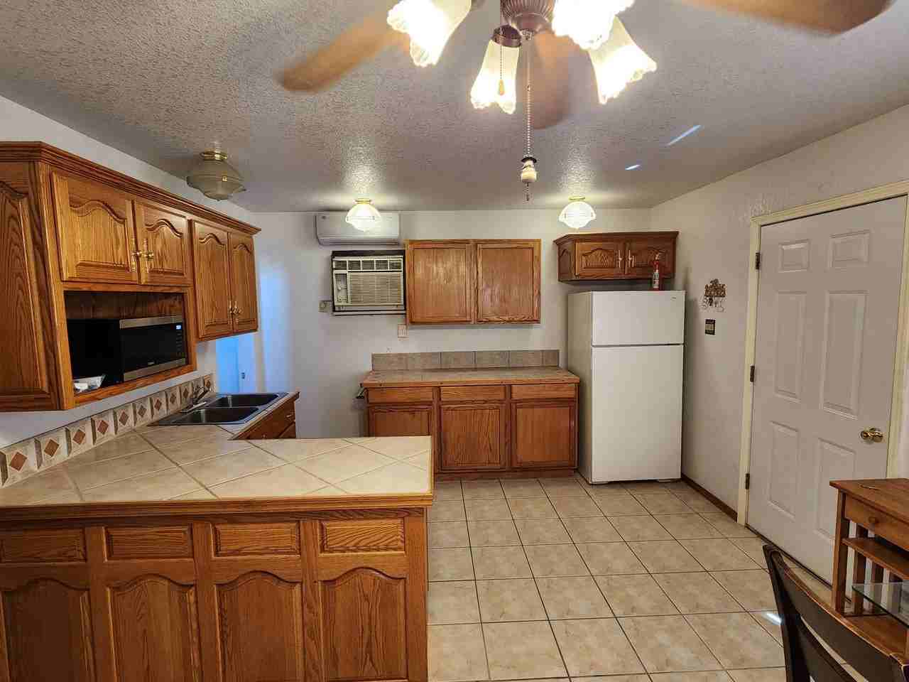 13698 E 51st St #A - Photo 2 of 8