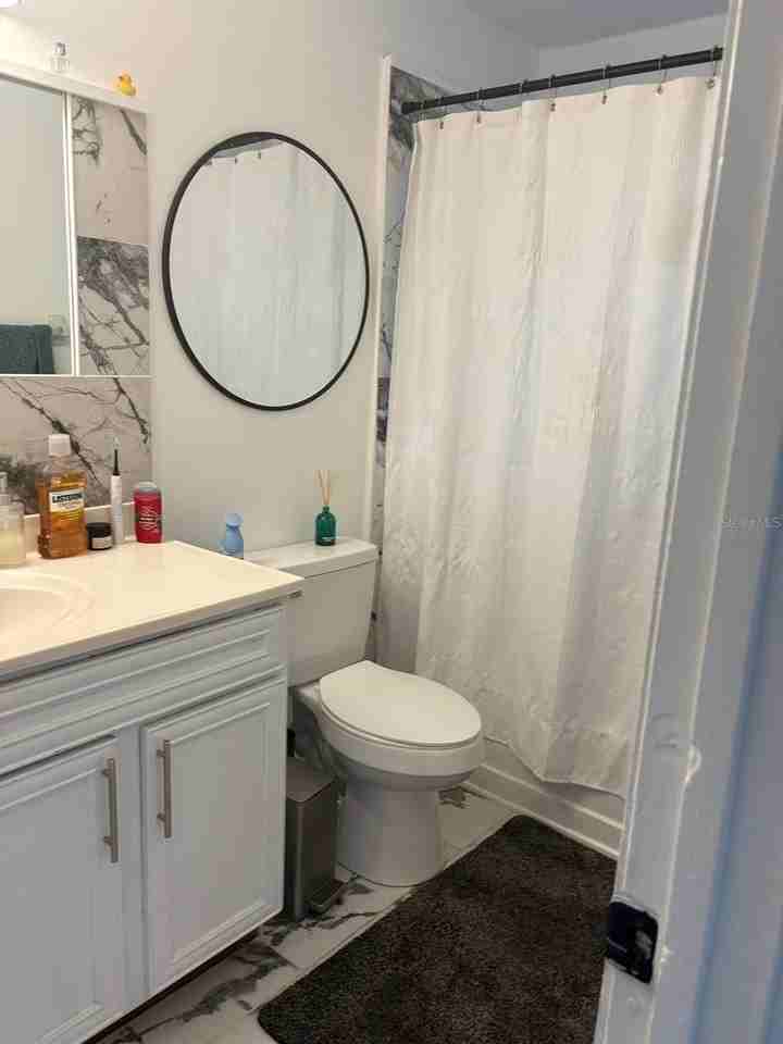 7703 Hillcrest Ter - Photo 4 of 13