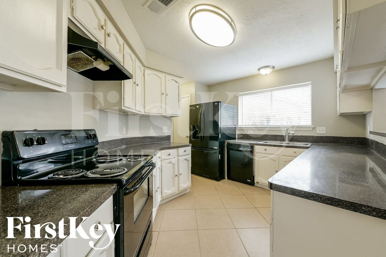 22219 Oakhill Gate Dr - Photo 6 of 15