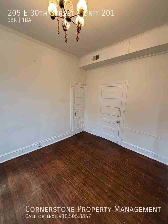 205 E 30th St #201 - Photo 4 of 12