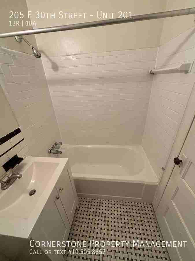 205 E 30th St #201 - Photo 5 of 12