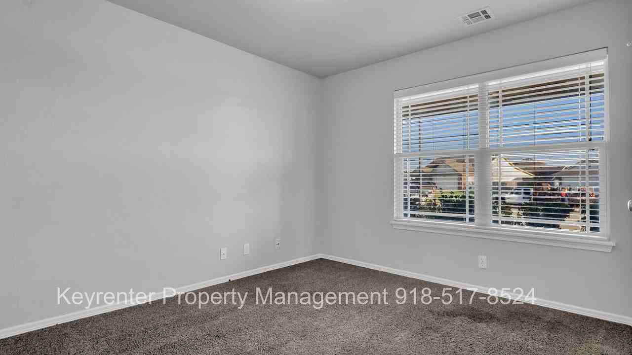 14709 E 107th Pl N - Photo 7 of 16