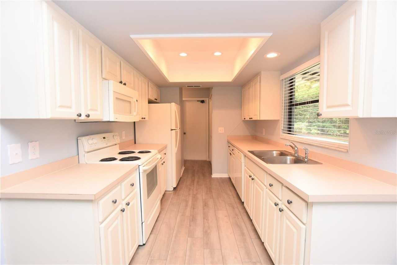 6305 Christina Groves Cir E - Photo 2 of 35